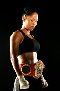 Kaliesha-West-looking-down-with-belt-pic