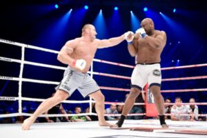 Pudz jabs Bob Sapp. Pic by Sherdog. Credit: Maciej Okraszewski